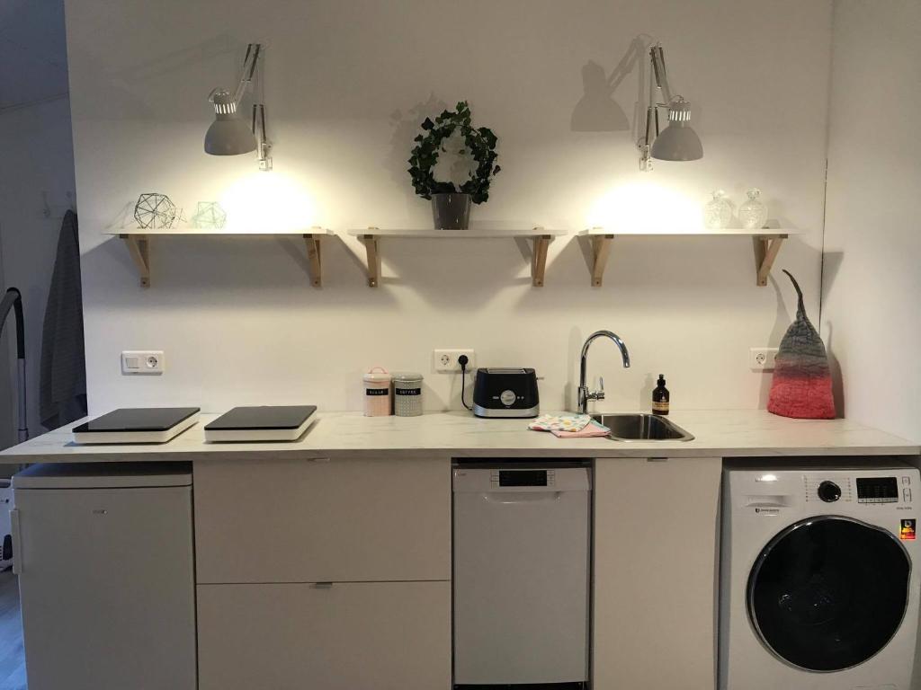 Kuchyň nebo kuchyňský kout v ubytování Downtown Selfoss - perfectly located apartment
