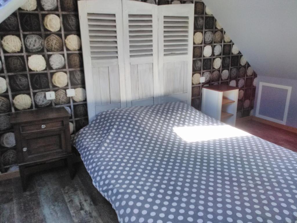 Postel nebo postele na pokoji v ubytování L' ancien pressoir 2