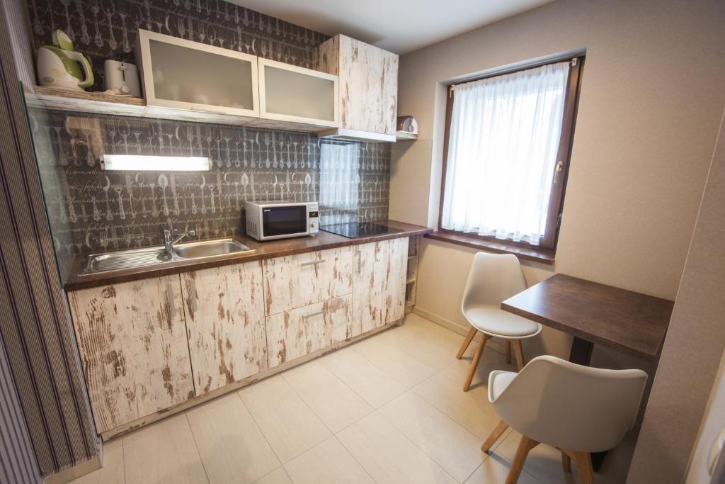 Levendula Apartmanház - Studio Apartment