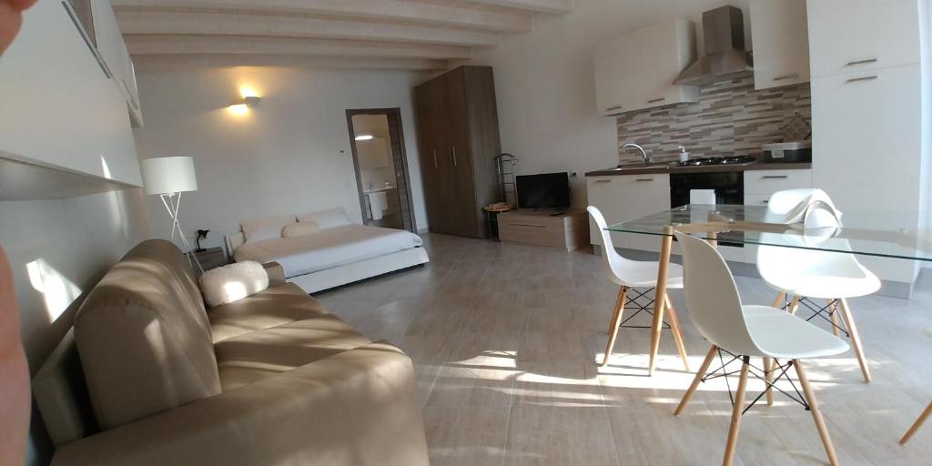 Postel nebo postele na pokoji v ubytování Paradeisos Residence Sas