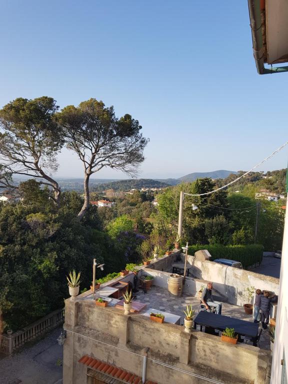 a view from the balcony of a house with plants at Villa Eugenia in Livorno