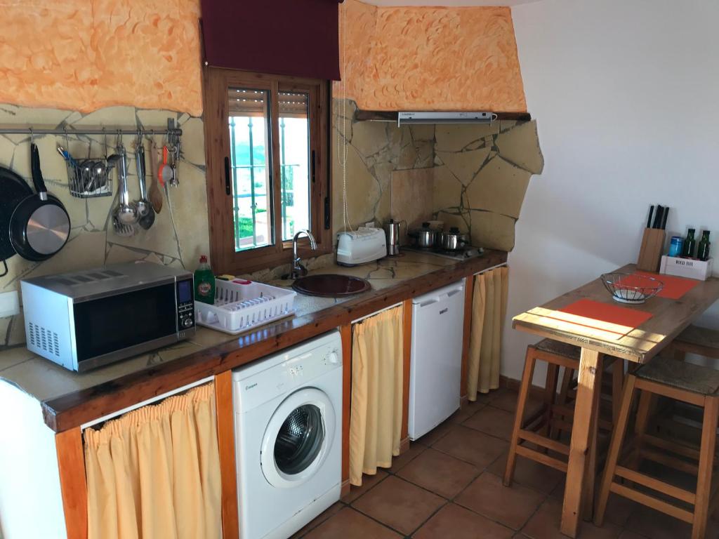 Kuchyň nebo kuchyňský kout v ubytování Casas El Molino