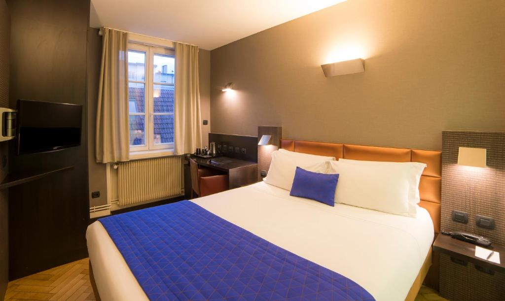 Postel nebo postele na pokoji v ubytování HANNONG Hotel & Wine Bar