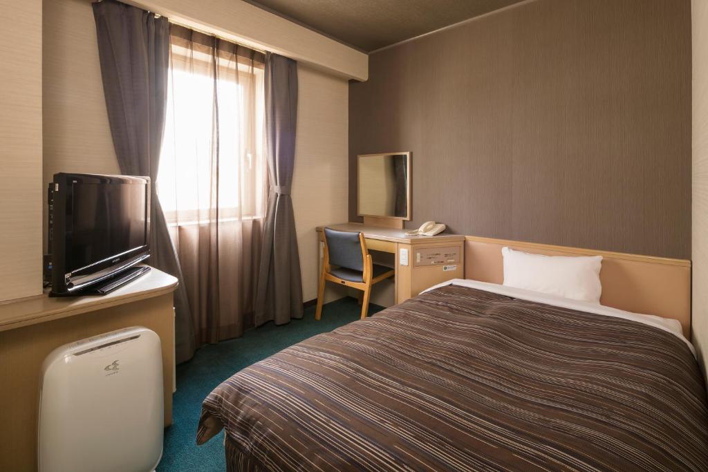 TV a/nebo společenská místnost v ubytování Ark Hotel Okayama -ROUTE INN HOTELS-