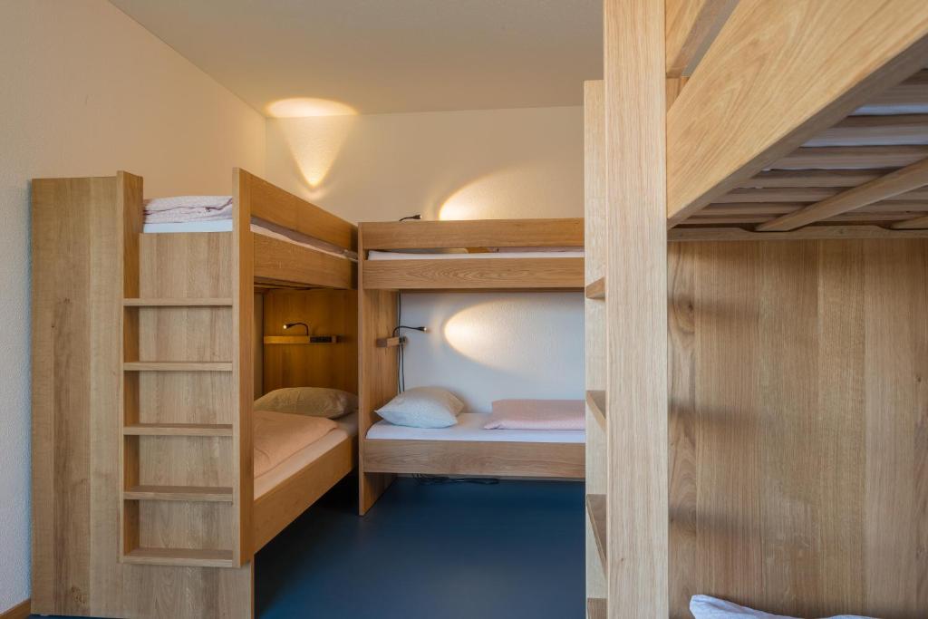 Postel nebo postele na pokoji v ubytování Zug Youth Hostel