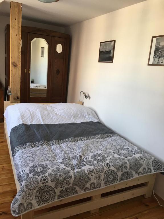 Posteľ alebo postele v izbe v ubytovaní Cichy Apartament na Nowym Świecie