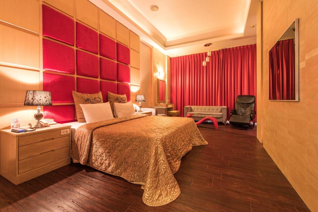 Postel nebo postele na pokoji v ubytování Hwu Meei Motel
