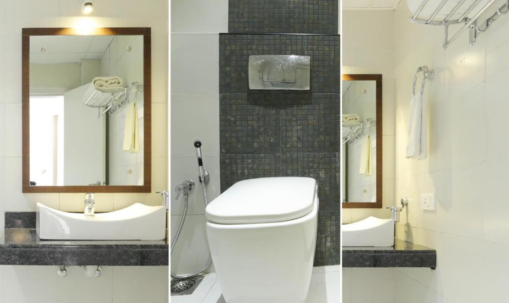 Koupelna v ubytování Hotel Crown Suites