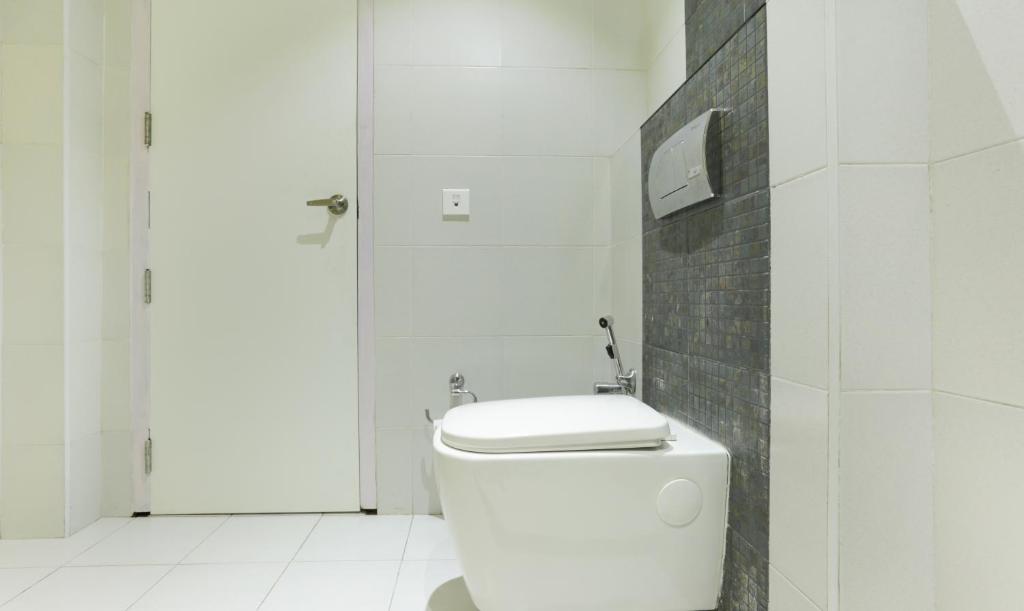 Koupelna v ubytování Hotel Crown Suites