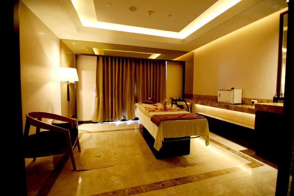 Postel nebo postele na pokoji v ubytování Radisson Blu Coimbatore