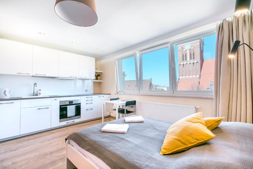 Kuchyň nebo kuchyňský kout v ubytování Loft Apartments