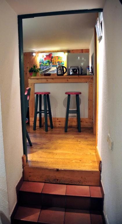 Kuchyň nebo kuchyňský kout v ubytování Hotel Du Clocher