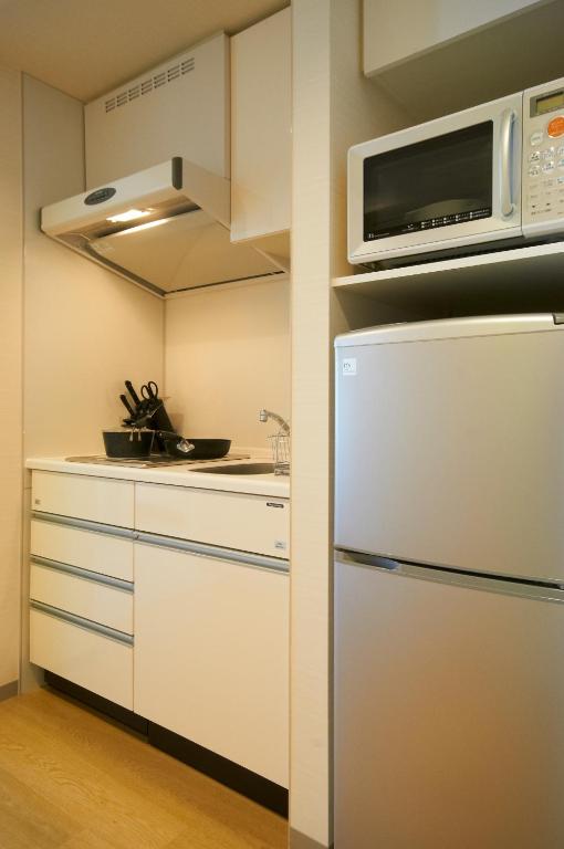 Kuchyň nebo kuchyňský kout v ubytování Fraser Residence Nankai Osaka