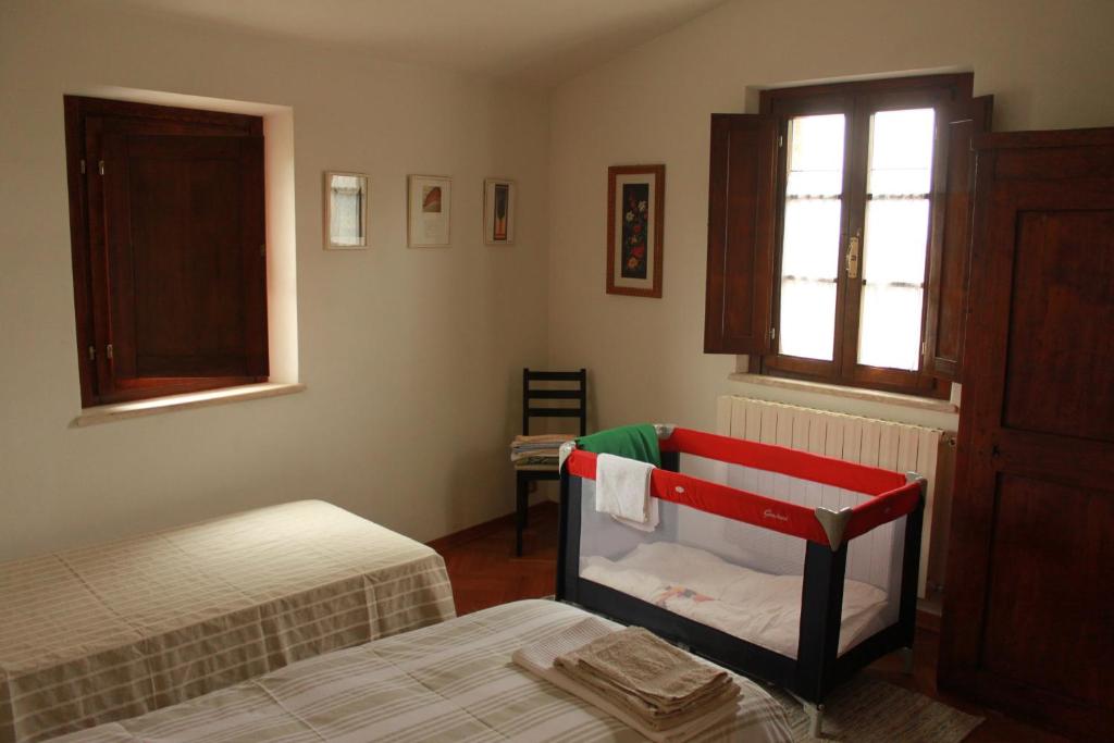 A bed or beds in a room at Vignano40