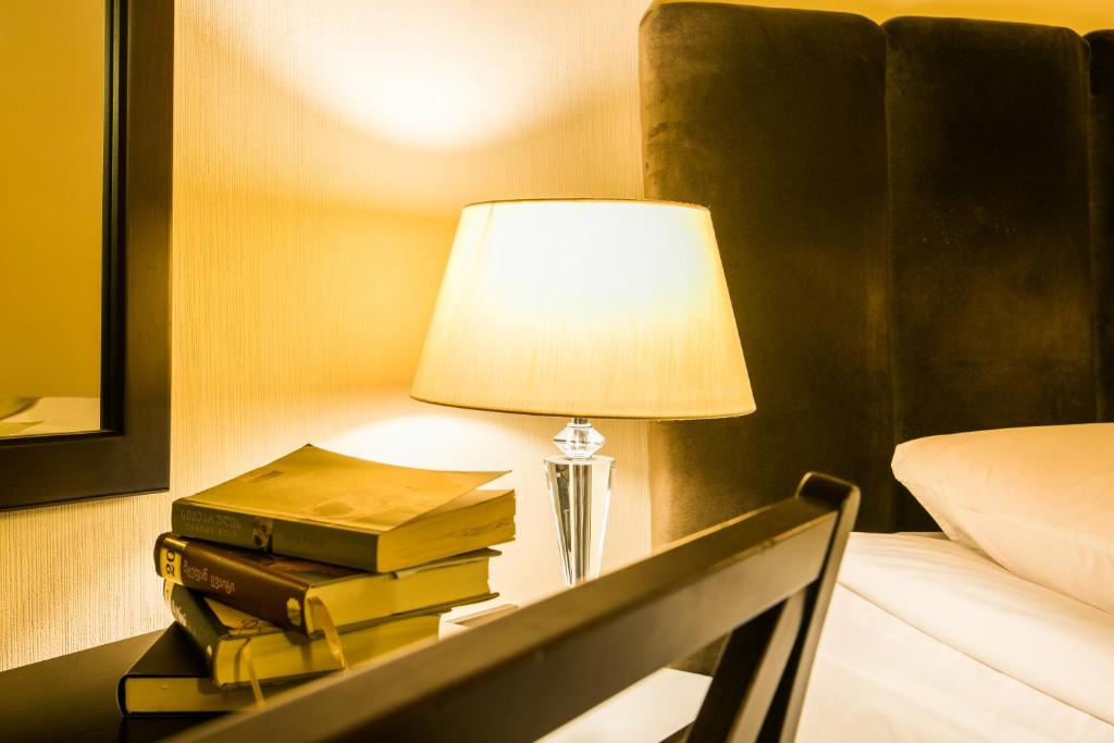 Postel nebo postele na pokoji v ubytování Hotel VIP