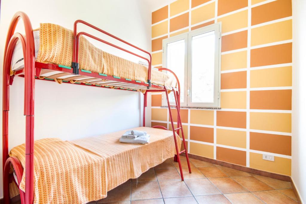 Posteľ alebo postele v izbe v ubytovaní Case Vacanze Paradise Beach Vicino Cefalù PISCINA APERTA