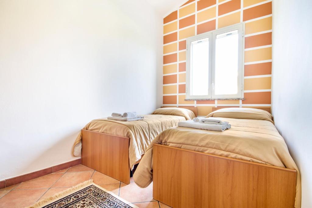 Posteľ alebo postele v izbe v ubytovaní Case Vacanze Paradise Beach Vicino Cefalù PISCINA APERTA