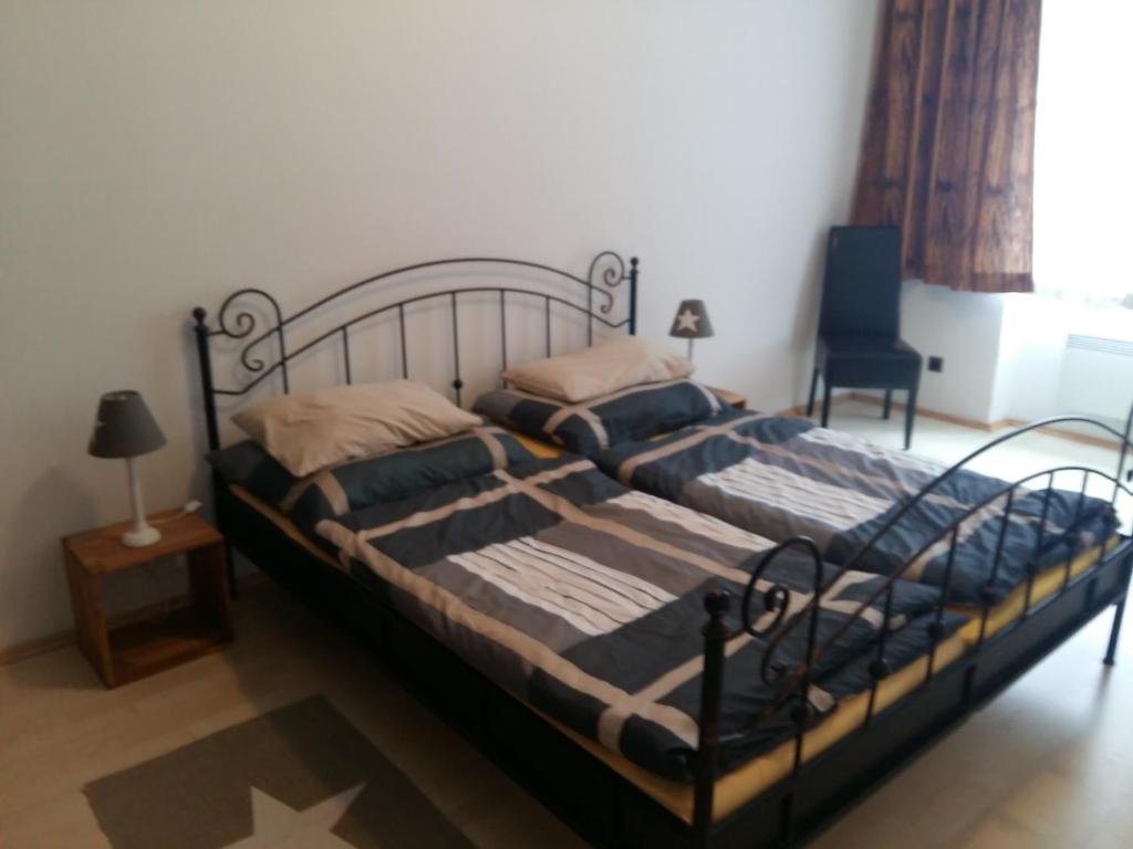 Posteľ alebo postele v izbe v ubytovaní Village Appartements