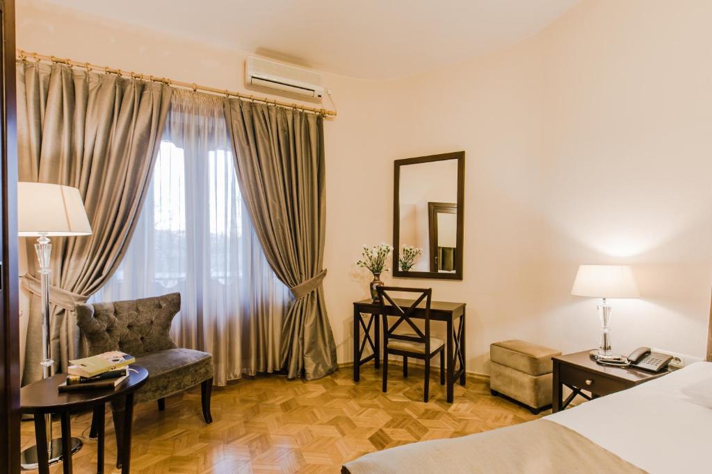 Postel nebo postele na pokoji v ubytování Hotel VIP