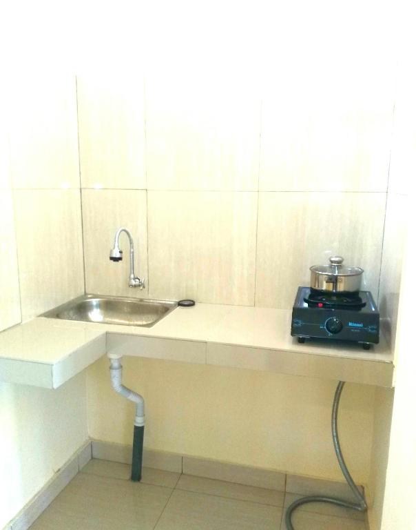 Kuchyň nebo kuchyňský kout v ubytování Qiul Guest House