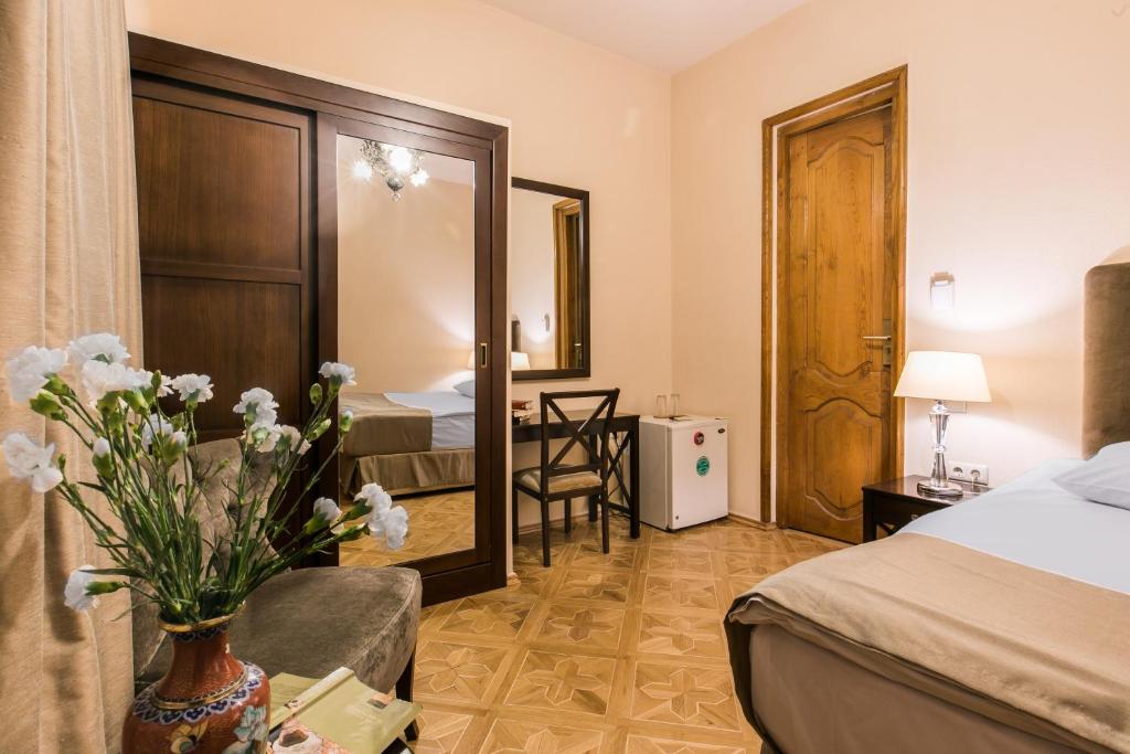 Postel nebo postele na pokoji v ubytování Hotel VIP