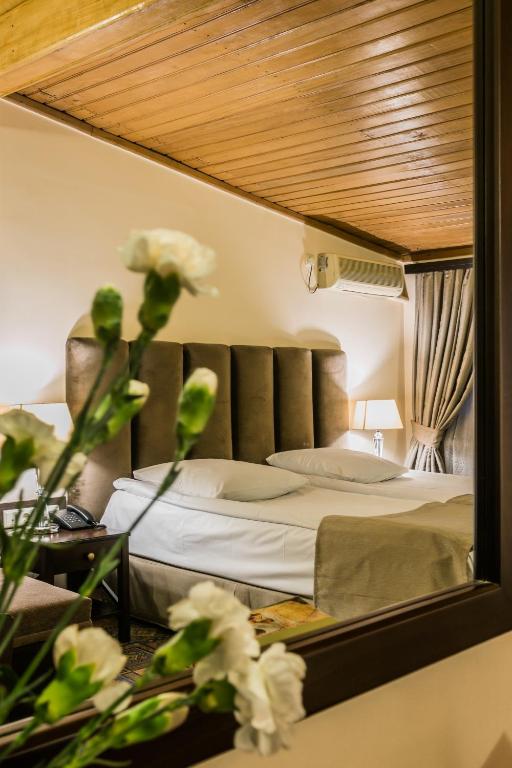 Postel nebo postele na pokoji v ubytování Hotel VIP