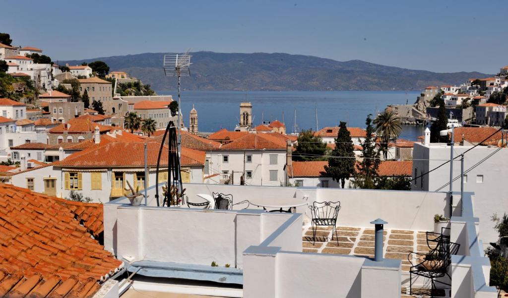 a view of a city from the roofs of buildings at Hydra Optima in Hydra