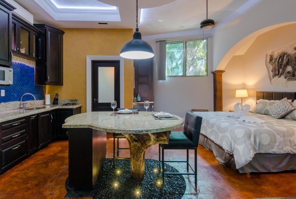 Postel nebo postele na pokoji v ubytování Hacienda Xcaret