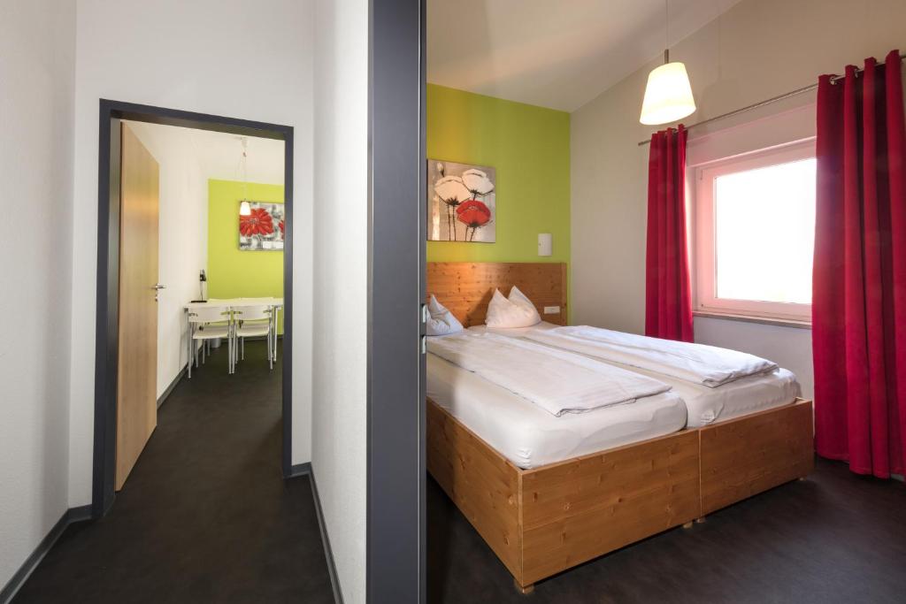 Postel nebo postele na pokoji v ubytování Hotel Demling