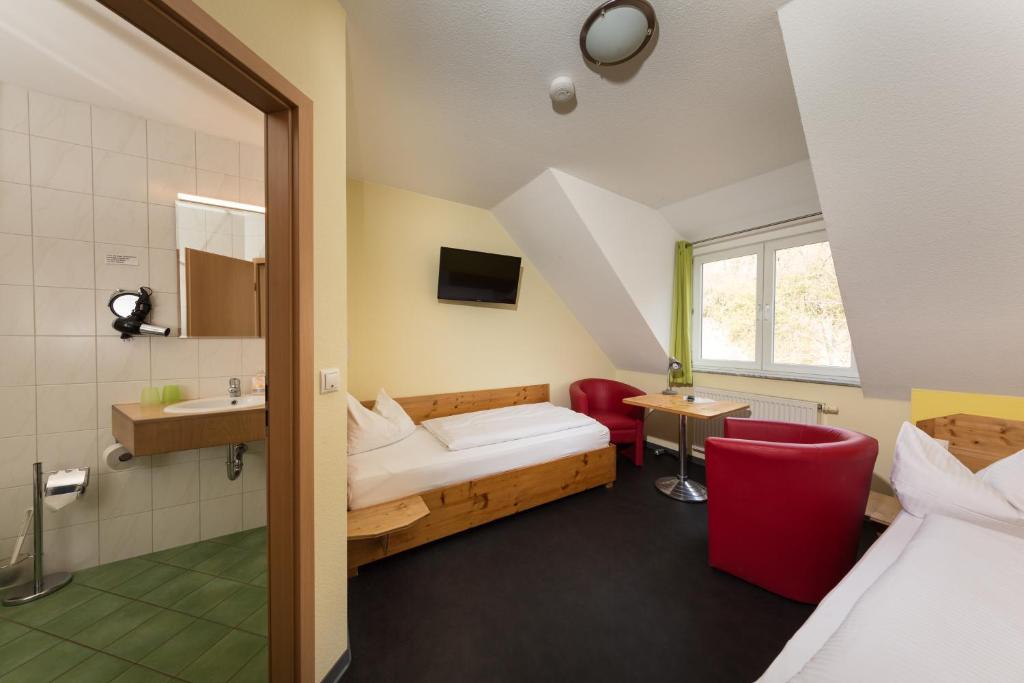 Postel nebo postele na pokoji v ubytování Hotel Demling