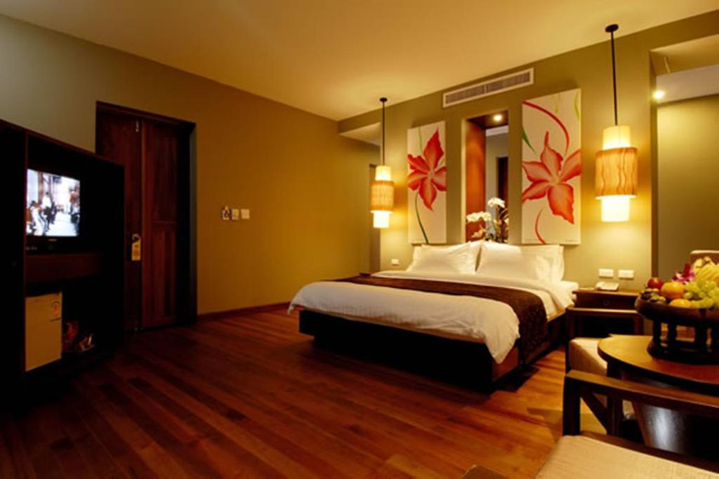 Postel nebo postele na pokoji v ubytování Chongfah Resort Khao Lak - SHA Extra Plus