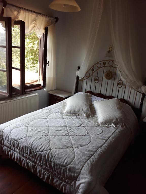 Postel nebo postele na pokoji v ubytování Mansion Theodora