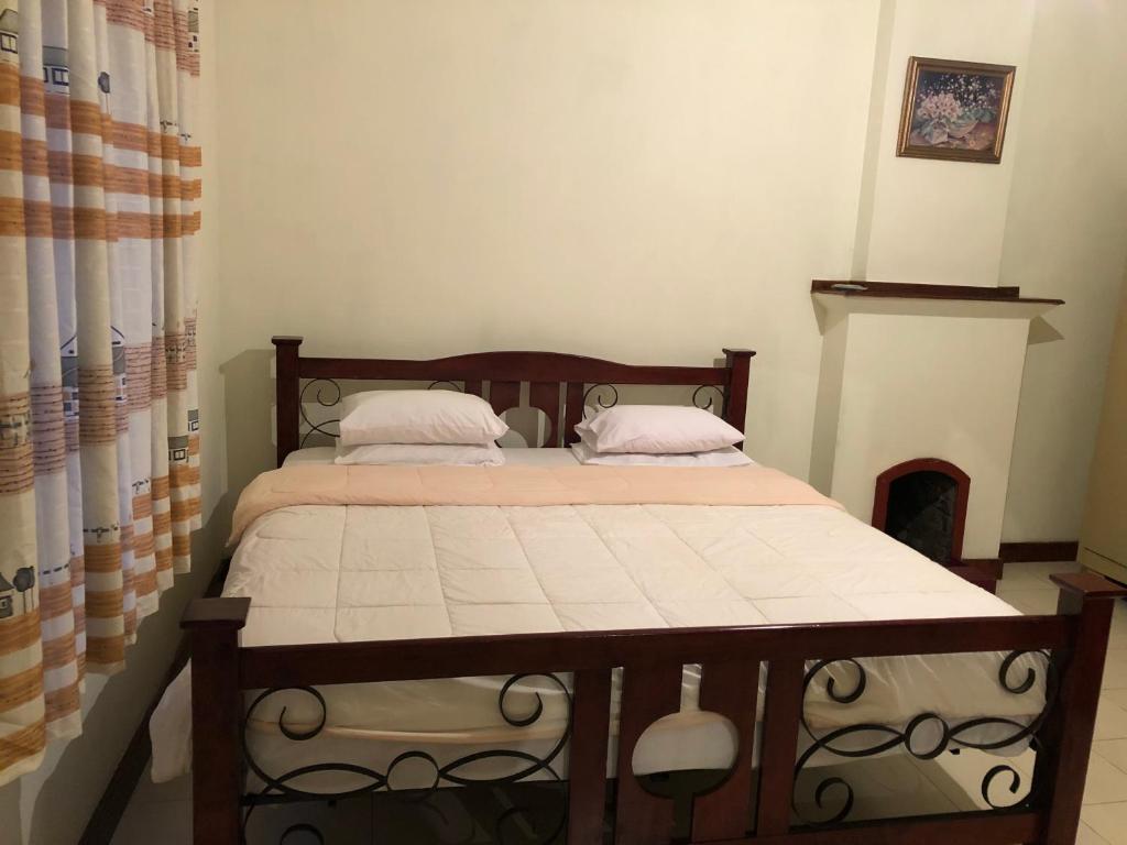 Postel nebo postele na pokoji v ubytování Bungalow 28