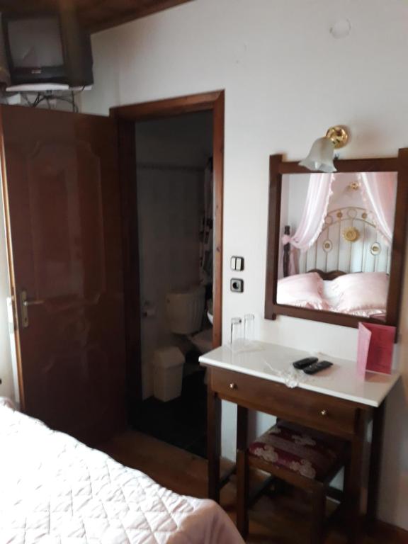 Postel nebo postele na pokoji v ubytování Mansion Theodora