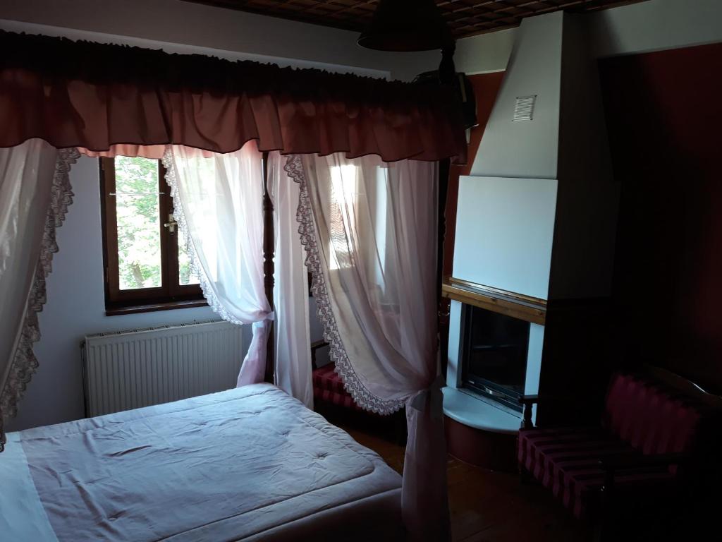 Postel nebo postele na pokoji v ubytování Mansion Theodora