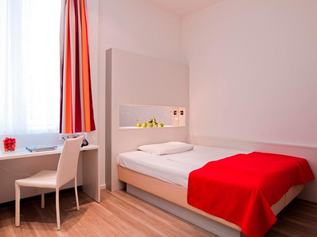 Llit o llits en una habitació de Hotel Zipser