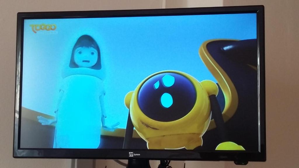 TV a/nebo společenská místnost v ubytování Hotel Garni Tahiti