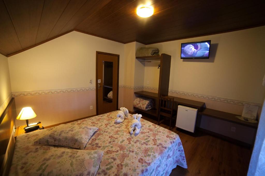 Postel nebo postele na pokoji v ubytování Pousada Vollweiter