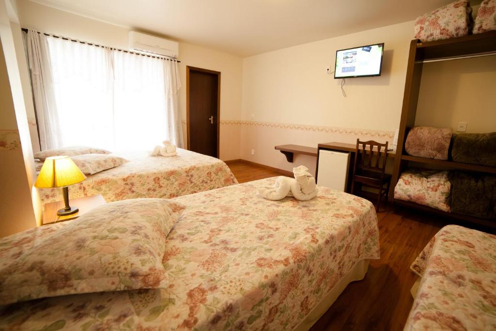 Postel nebo postele na pokoji v ubytování Pousada Vollweiter
