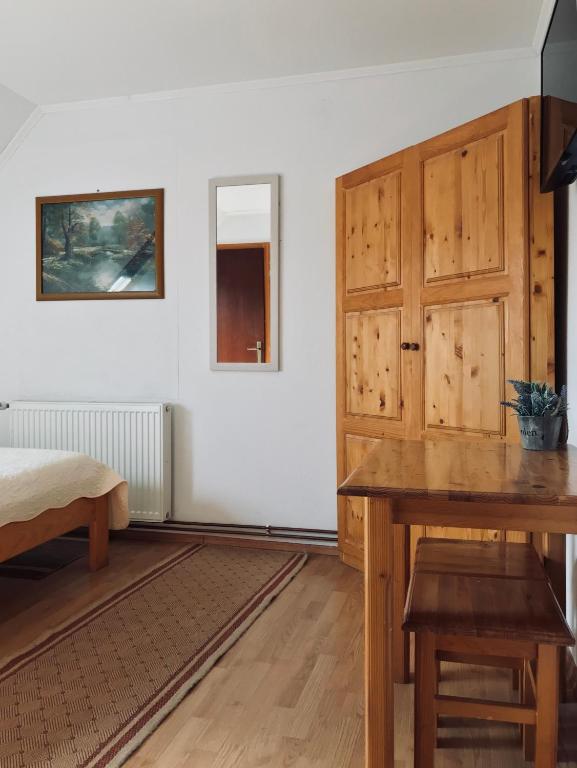 Televízia a/alebo spoločenská miestnosť v ubytovaní Guest House Aurora