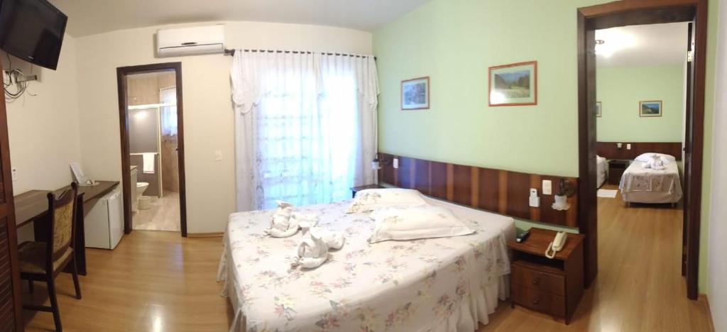 Postel nebo postele na pokoji v ubytování Pousada Vollweiter