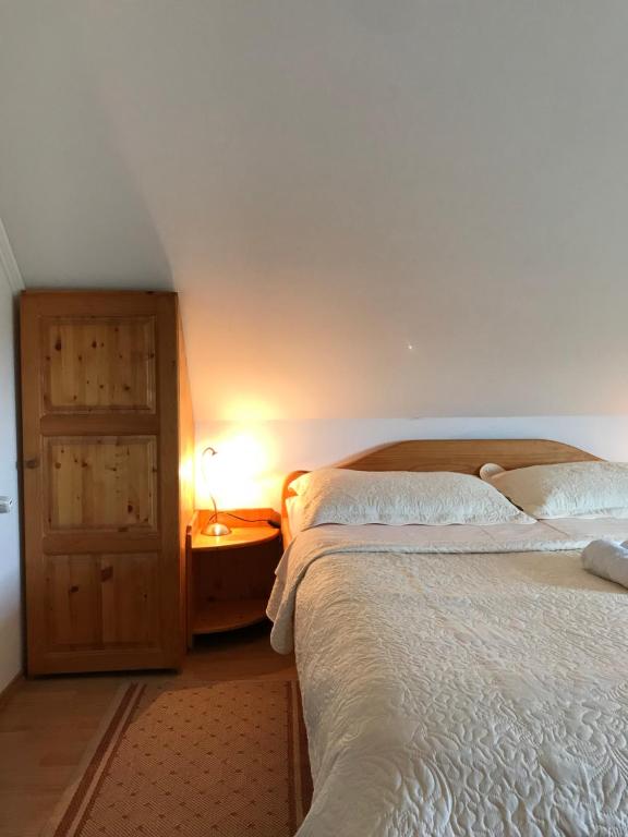 Posteľ alebo postele v izbe v ubytovaní Guest House Aurora
