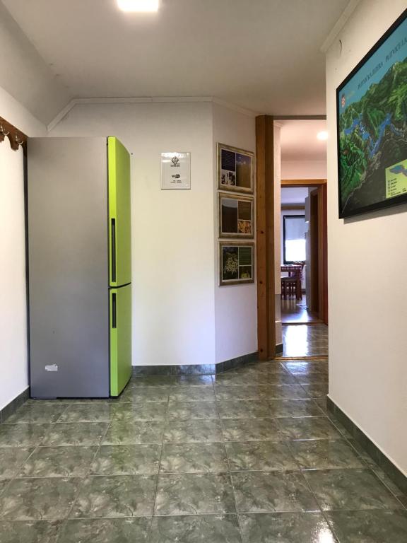 Televízia a/alebo spoločenská miestnosť v ubytovaní Guest House Aurora