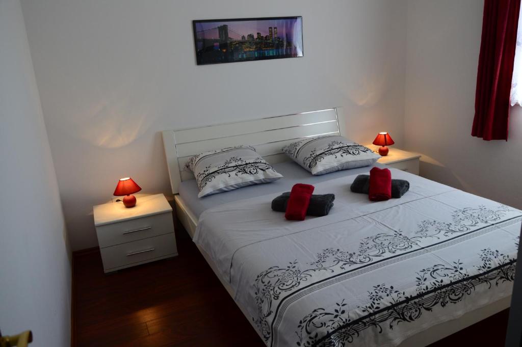 Postel nebo postele na pokoji v ubytování Apartment Olic