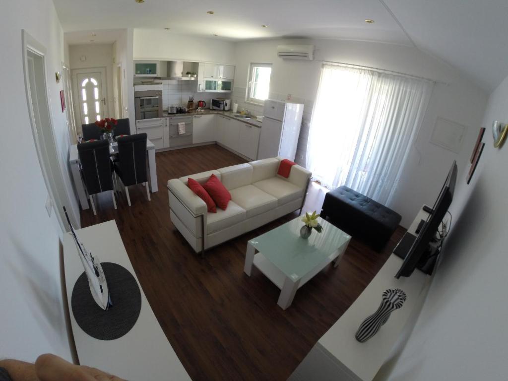 Kuchyň nebo kuchyňský kout v ubytování Apartment Olic