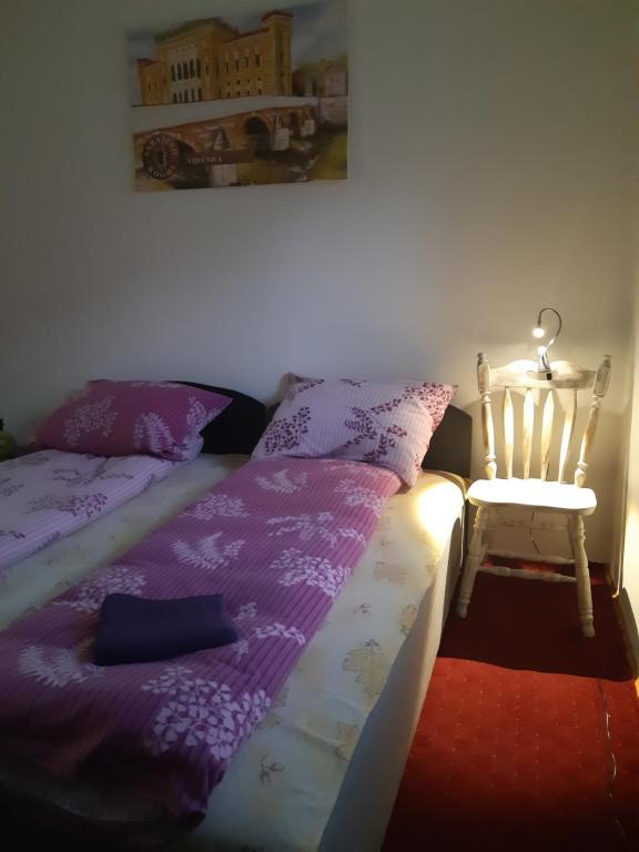 Letto o letti in una camera di Sarajevo Rooms
