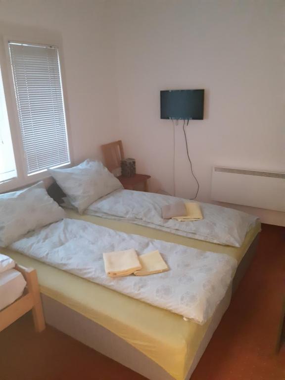 Letto o letti in una camera di Sarajevo Rooms