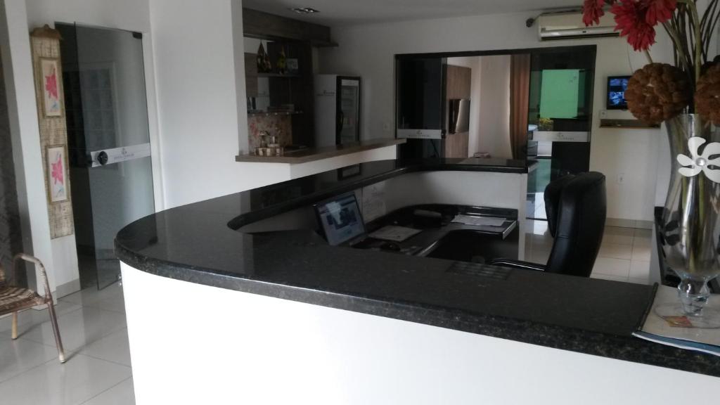 Kuchyň nebo kuchyňský kout v ubytování Hotel Ferrari