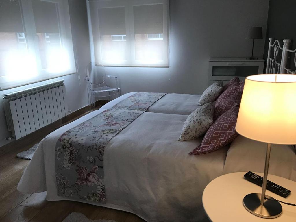 Cama o camas de una habitación en Ideal piso moderno
