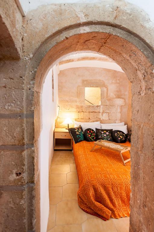 Postel nebo postele na pokoji v ubytování Hamam Suites Sifaka